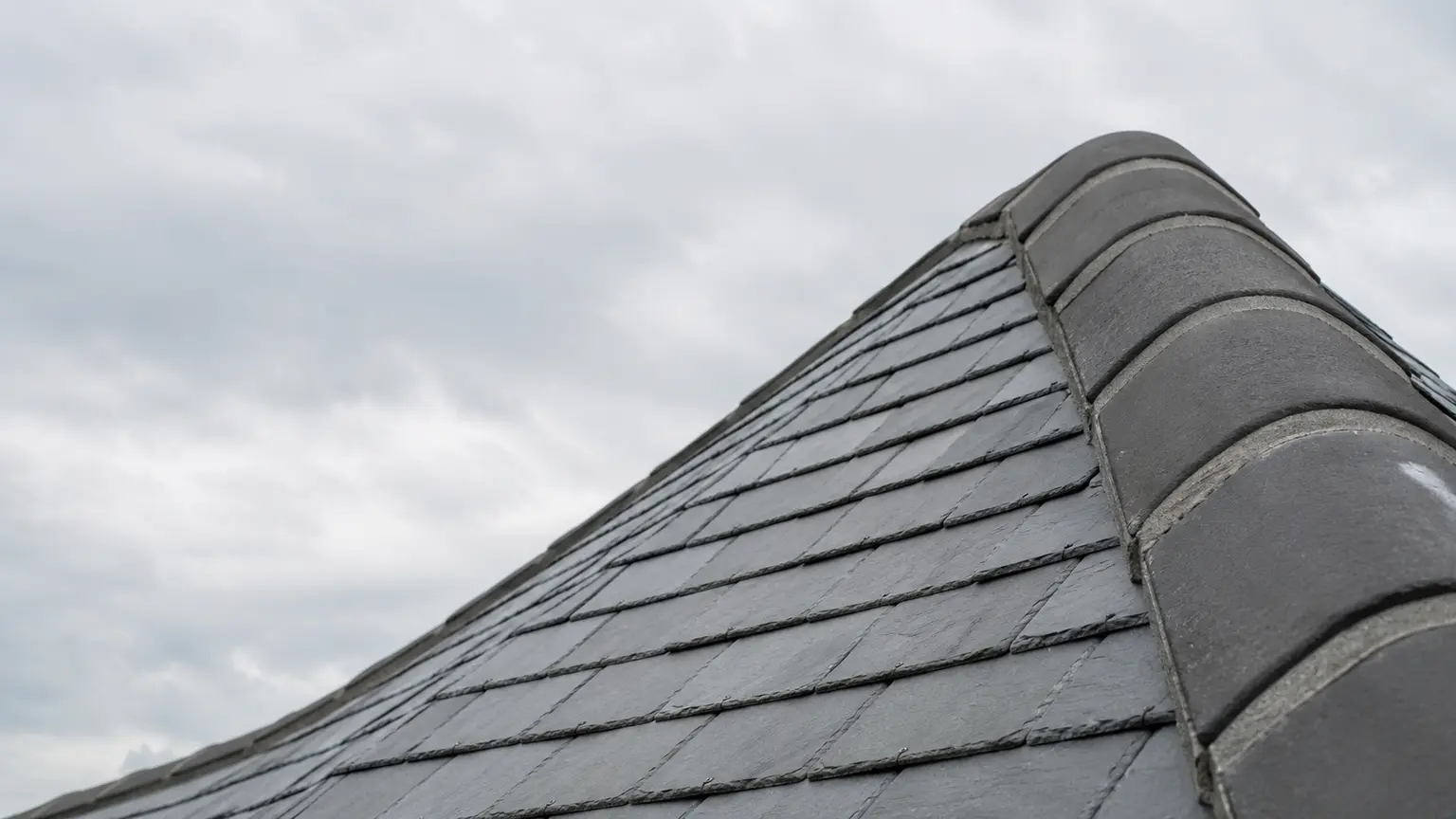 Pitched roof ridge tiles